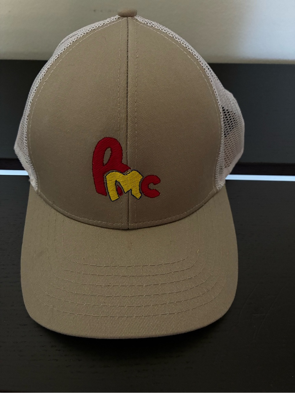 Men’s Mesh Trucker Hat with Red & Yellow Logo - Tan